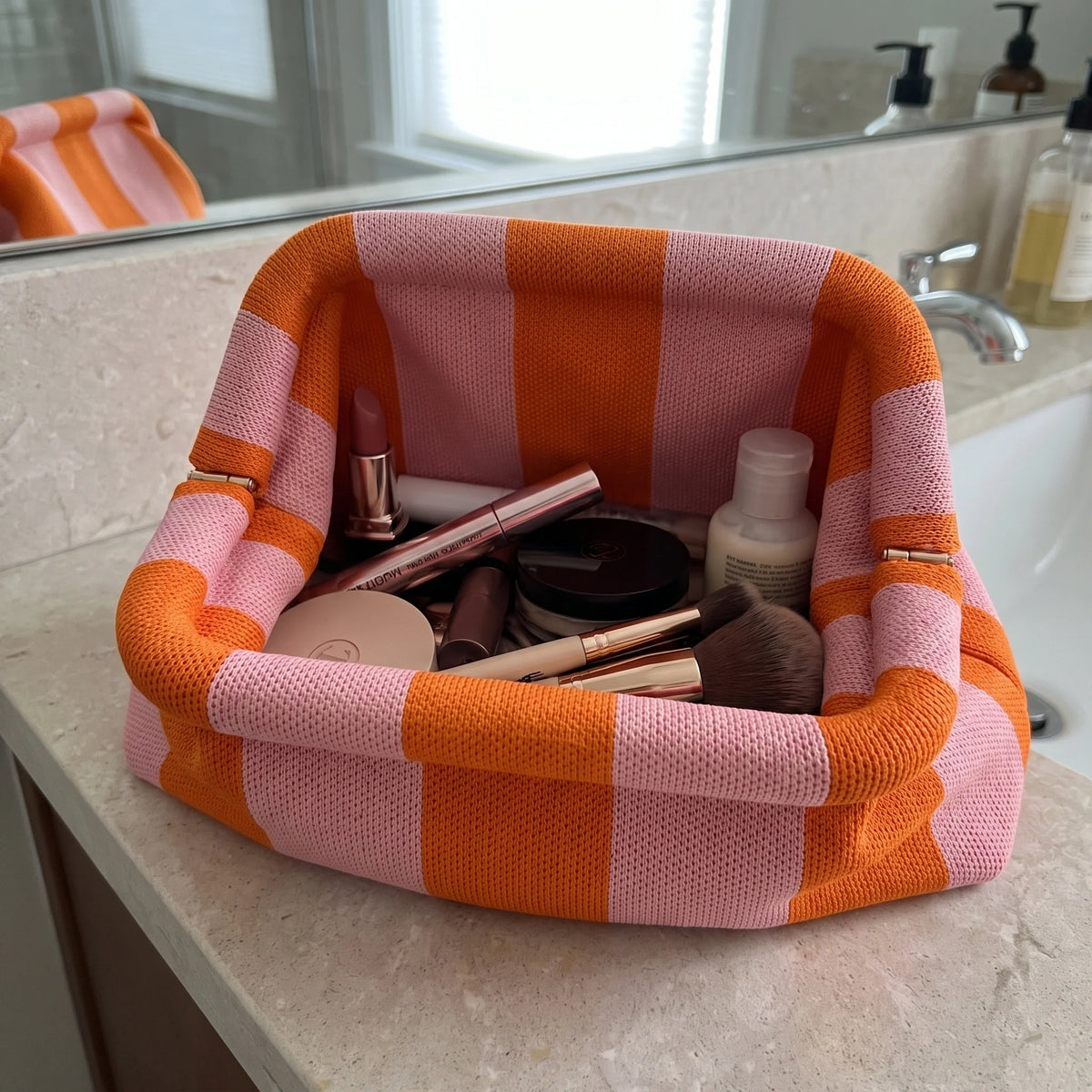 Vany - The Snap-Shut Makeup Bag